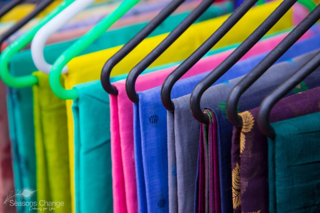 Colour analysis involves a trained consultant examining the natural tones in your skin, hair, and eyes to identify the best colours for you to wear, ensuring they harmonize with your unique colouring. This applies to your clothing, jewellery, make-up, and hair colour. The focus of colour analysis is not on the colour itself, but on the tone and how it interacts with your natural colouring. For instance, while you can wear blue, green, or red, the specific shades that suit you may differ from those that suit someone else, due to variations in natural colouring. There are two primary methods of colour analysis: 1. Seasonal Colour Analysis: This widely known method categorizes all colour tones into four groups named after the seasons. For example, if someone says they are an Autumn, it means they look best in colours from the ‘autumn’ palette, which includes warm tones, deeper colours, and slightly muted shades. 2. Tonal Colour Analysis: This method expands the seasonal categories into 12 groups, labelled by the most dominant aspect of each colour group. For instance, an Autumn person might be classified as Warm and Deep in the tonal system (this is me!). Clients receive a dominant colour direction (e.g., warm) and a secondary direction (e.g., deep). This in-depth method provides detailed advice based on the dominant traits in an individual’s colouring. A consultant will help you to find your best colours by taking into account your skin tone, undertone, hair and eye colour and by using a set of colour drapes. It’s much easier than trying to figure it out yourself! During my consultations I use a combination of both seasonal and tonal systems. Why? Some people fit neatly into a season and others don’t! So the analysis should be as individual as you are! Contact me to find out more.